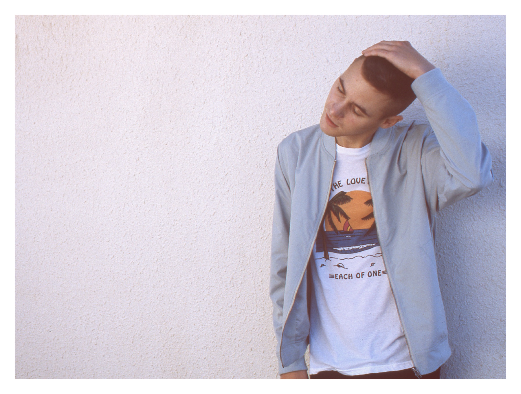 Light bomber jacket and graphic T-shirt
